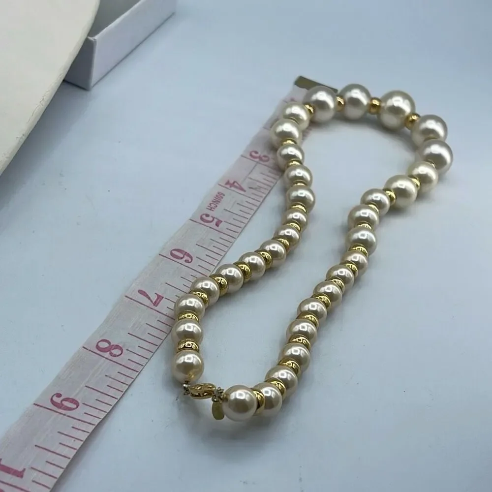 Vintage Napier glass graduated faux pearl with gold tone spacers necklace.